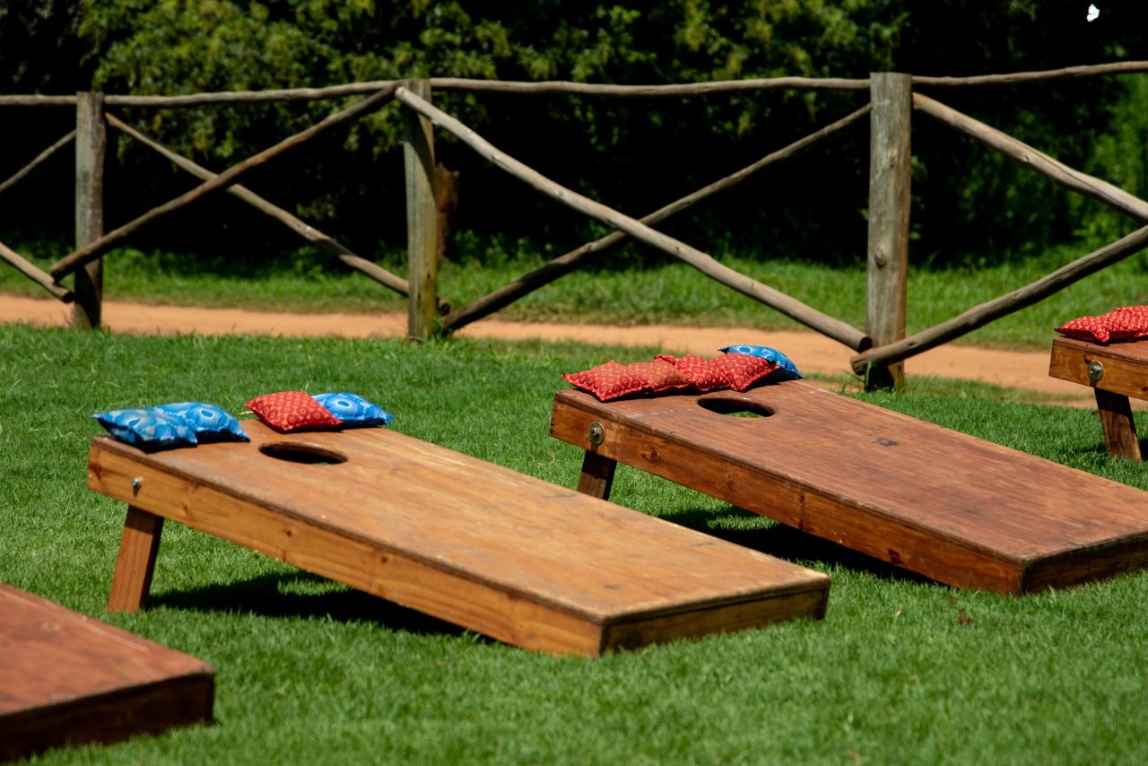 Cornhole game at the Inspired by Play area