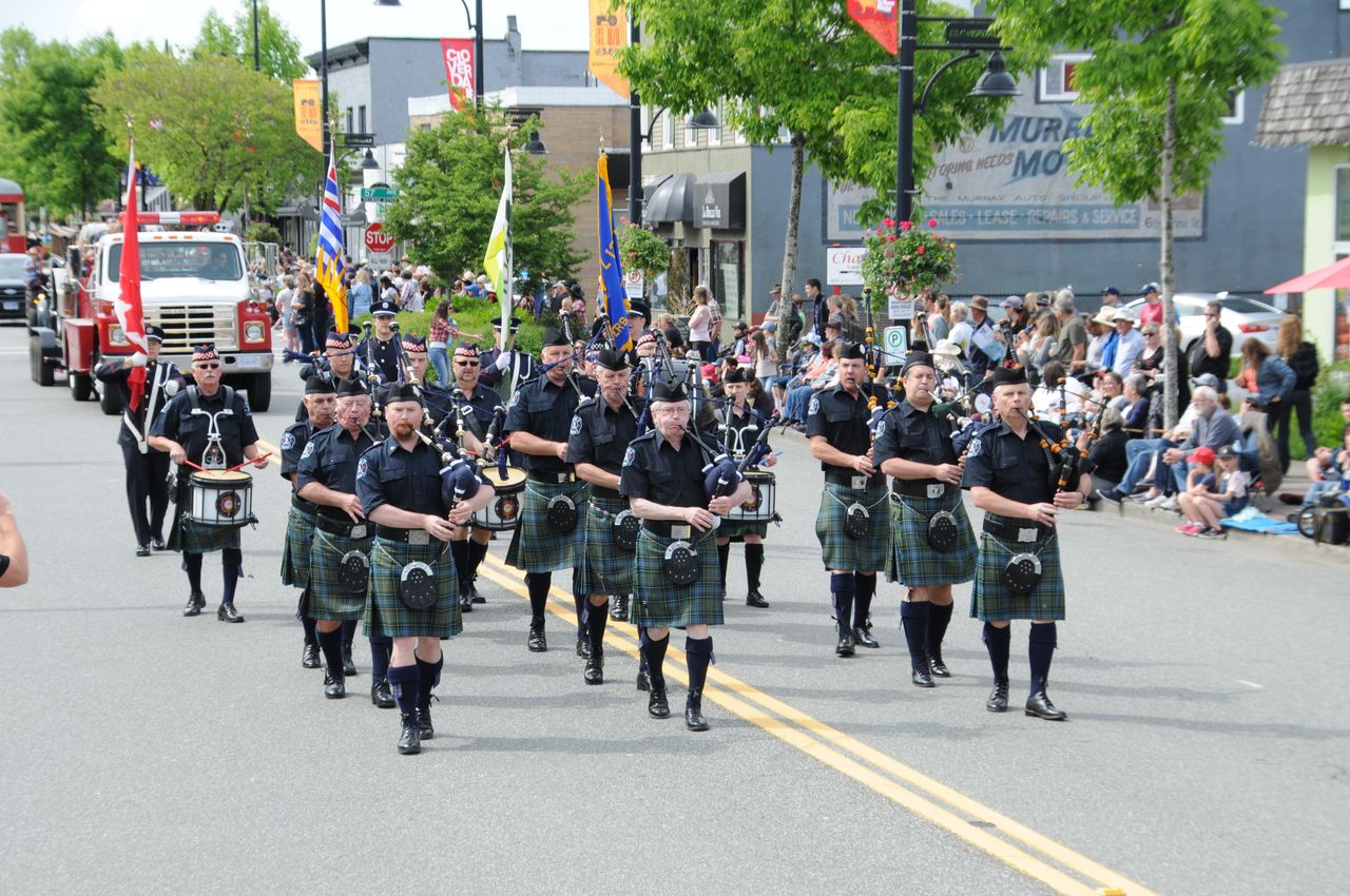 Spectators lining the parade route in Cloverdale Town Centre