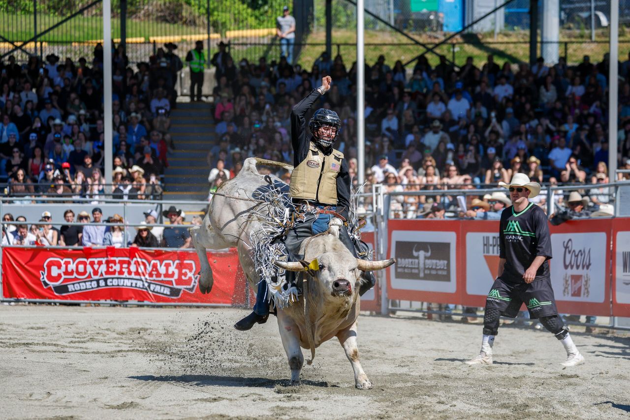 Bull rider in action at the 2026 Cloverdale Rodeo