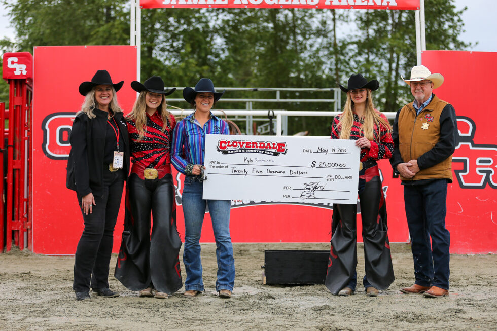 2025 Cloverdale Rodeo Barrel Racing Champion Kyla Simmons holding the cheque